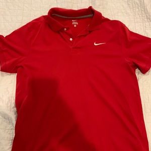 Nike Polo. 100% cotton. Size L (but fits like a medium). Like new
